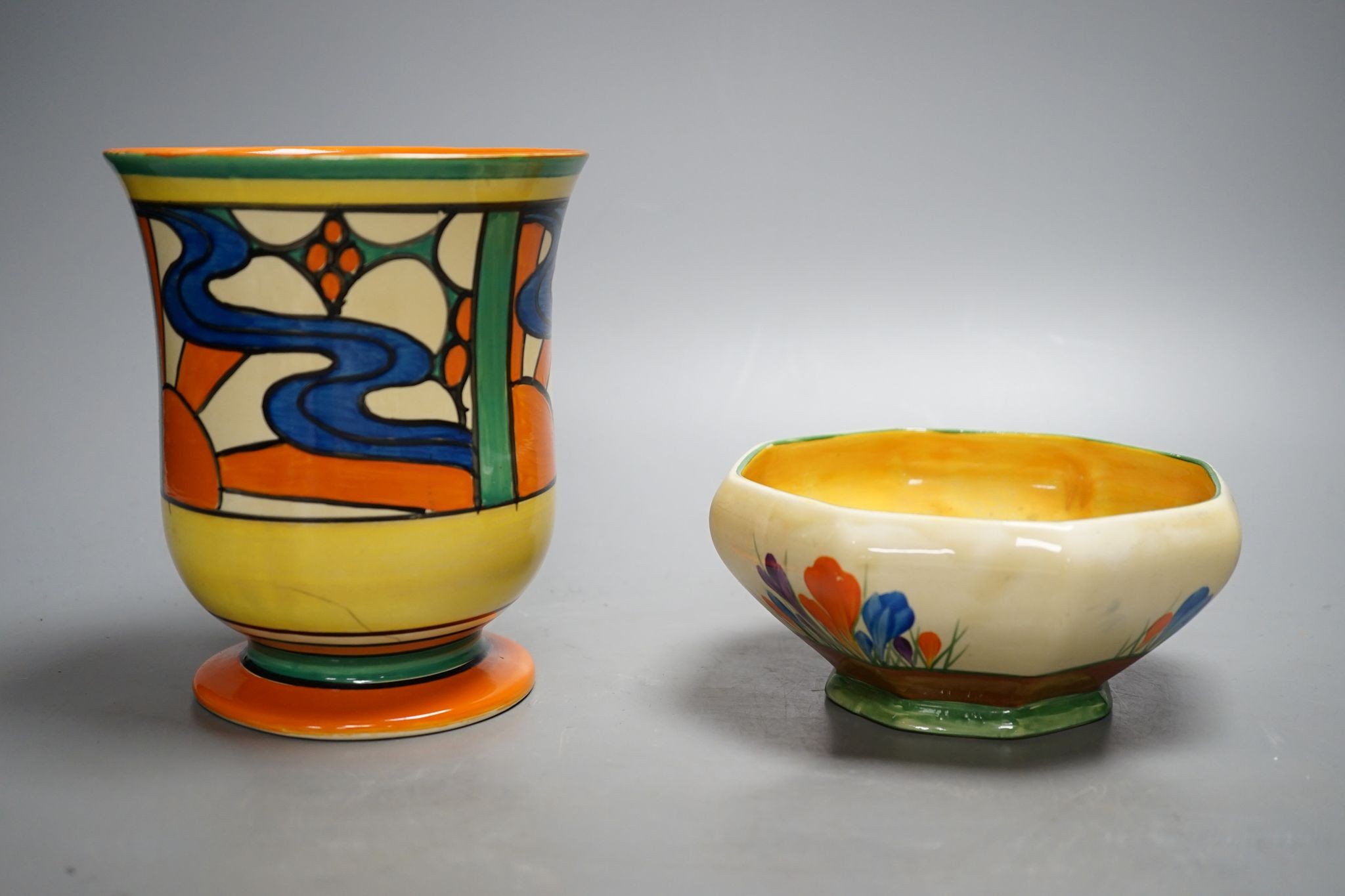 A Clarice Cliff Fantasque vase and two other Clarice cliff items